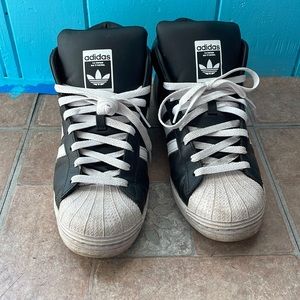 Adidas black & white high tops men’s 8